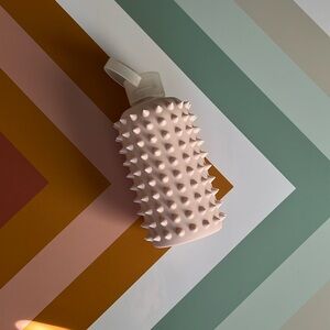 Pale pink spiked bkr water bottle